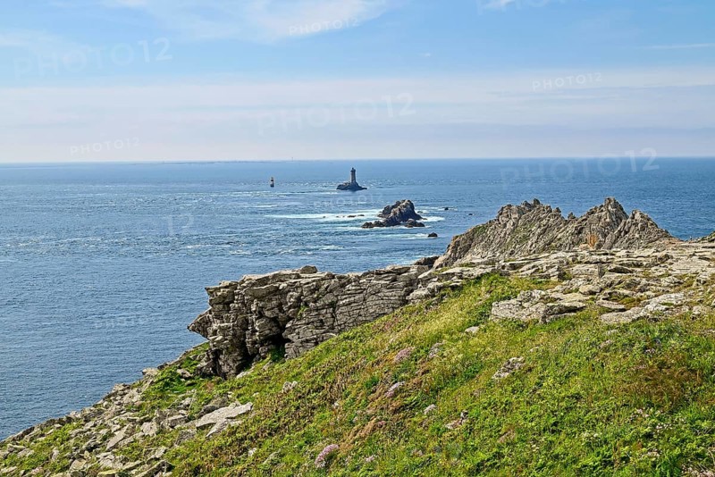 Atlantic Ocean in front of the rocks at Pointe du Raz, Plogoff, Finistere, Brittany, France, Europe