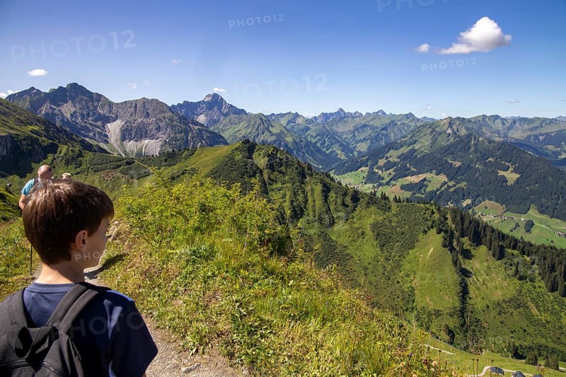 Hiking in the Allgaeu Alps: Boy hiking in the Kanzelwand area (Kleinwalsertal, Austria)