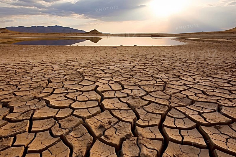 Dry cracked earth with drying lake. Climate change and water shortage concept. KI generiert, generiert AI generated