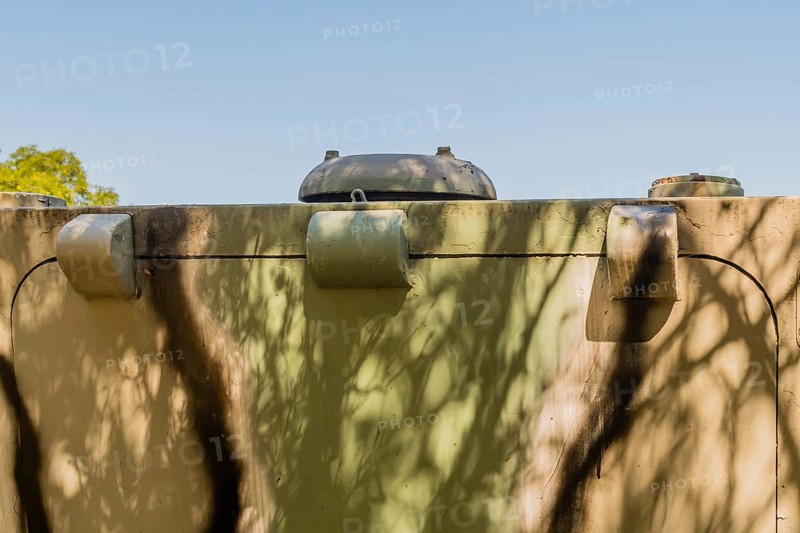 Hinges on back hatch of armored personal carrier on display in public park
