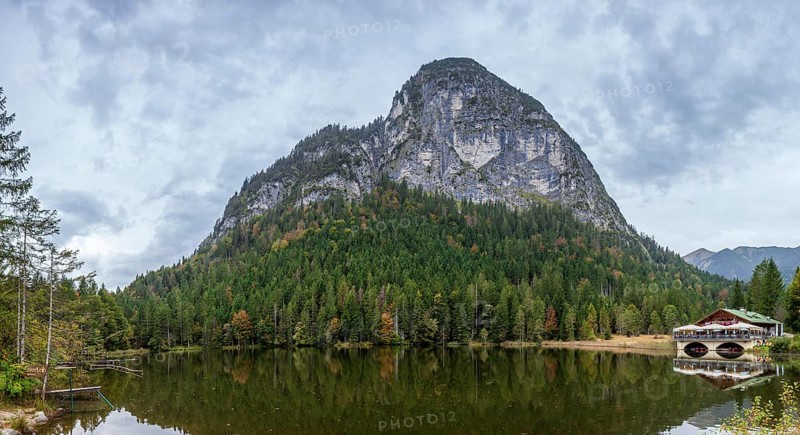 Pflegersee with inn under a cloudy sky, Garmisch-Partenkirchen, Werdenfelser Land, Upper Bavaria, Bavaria, Germany, Europe