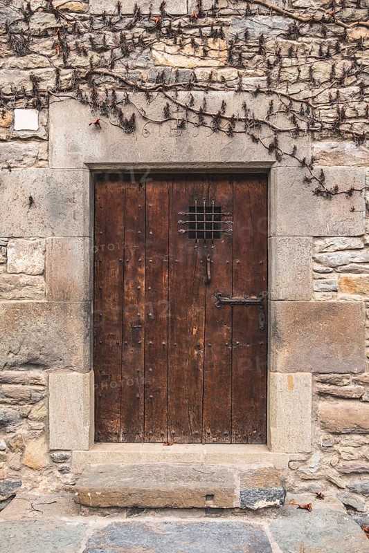 Detail of a door in a medieval house in Rupit in Catalonia Spain