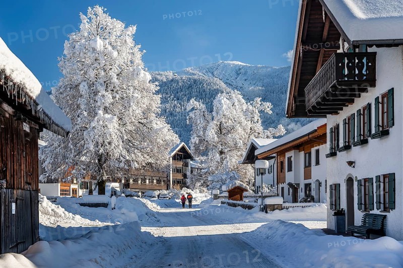 Winter village street with Heimgarten 1791m, Ohlstadt, Loisachtal, The Blue Country, Bavarian Alps, Upper Bavaria, Bavaria, Germany, Europe