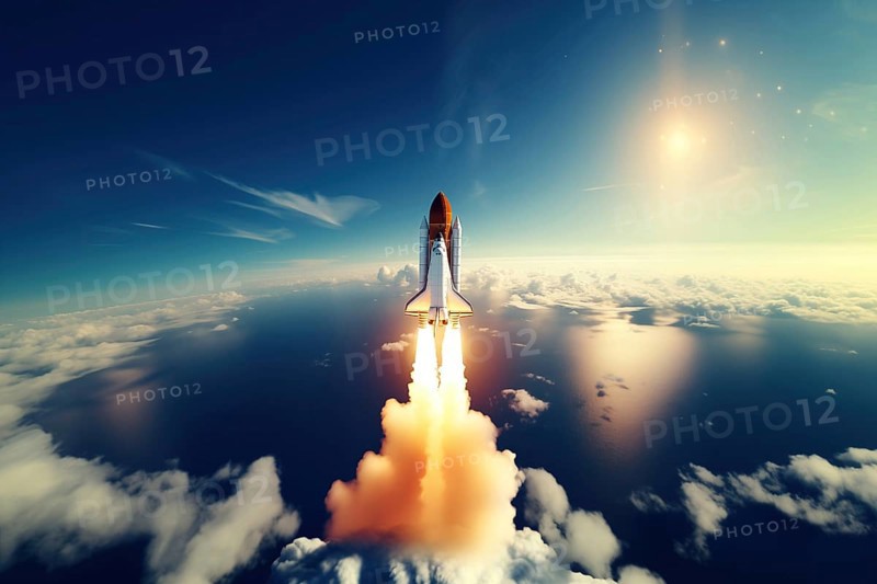 Aerial view of a rocket shuttle carrier launch at sunrise over an ocean coast. The rocket is blasting off with a trail of smoke and flames behind it, AI generated