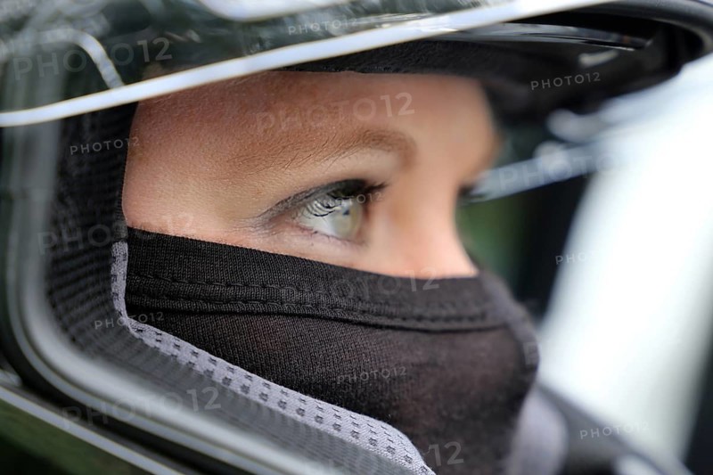 Racer with helmet and balaclava