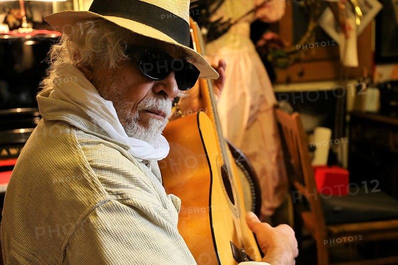 Guitar player, musician plays the guitar
