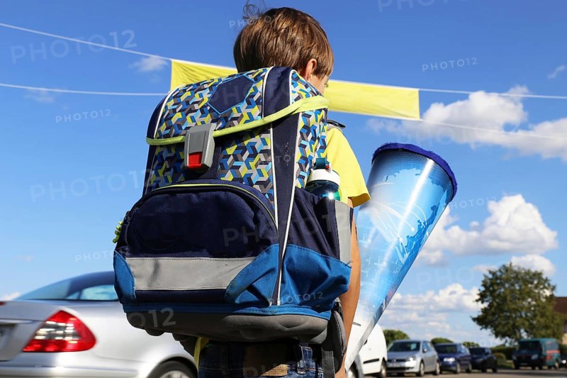 Child on the way to his first day of school, (Mutterstadt, Rhineland-Palatinate)