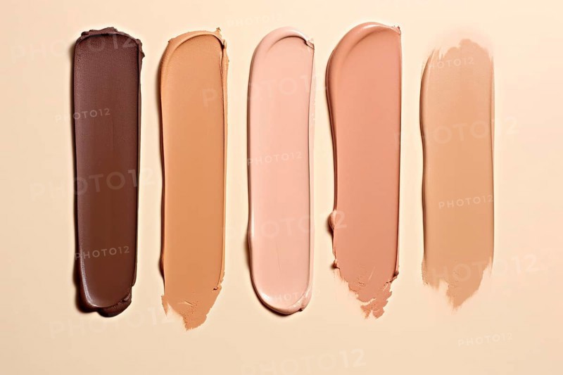 Makup foundation swatches with different light and dark colored skin tones. KI generiert, generiert AI generated