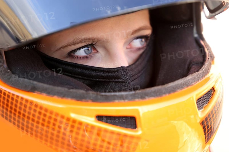 Racer with helmet and balaclava