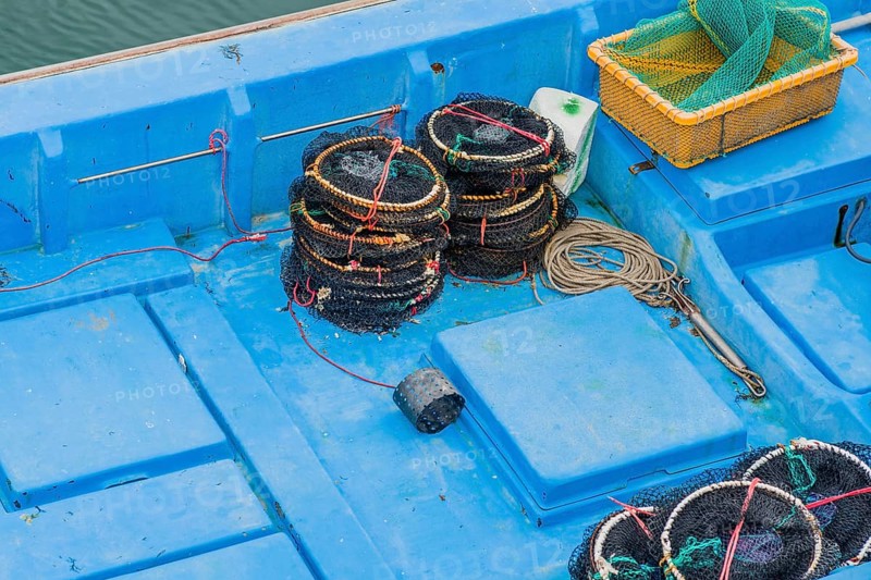 Crab traps on deck of fishing trawler in Yeosu, South Korea, Asia