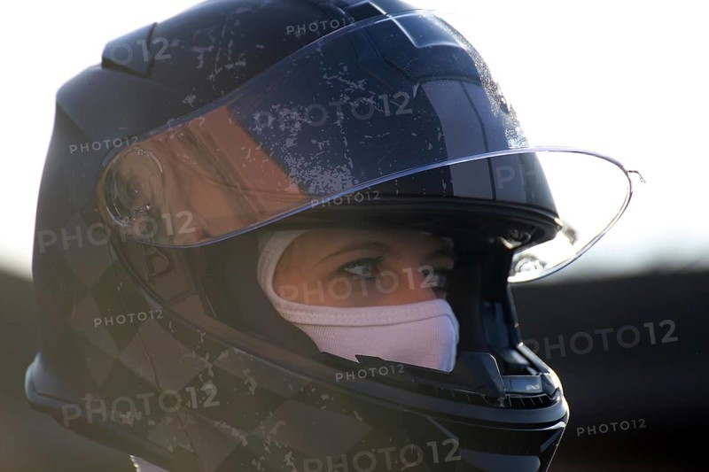 Racer with helmet and balaclava