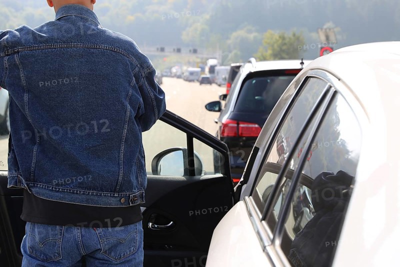 Traffic jam on the motorway with exemplary emergency lane (A 7 near Aalen, Baden-Wuerttemberg)