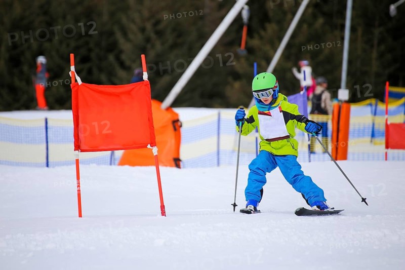 Child at a guest ski race in a ski resort