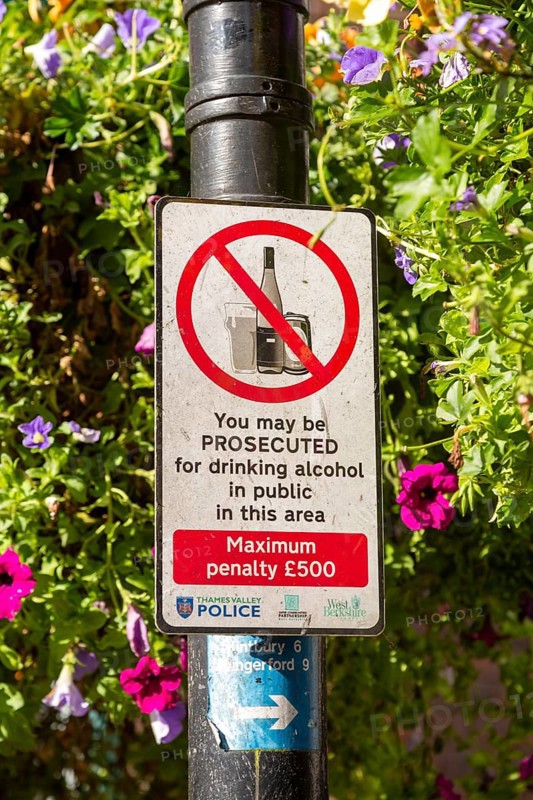 Sign warning about prosecution for drinking alcohol in public area, Newbury, Berkshire, England, UK