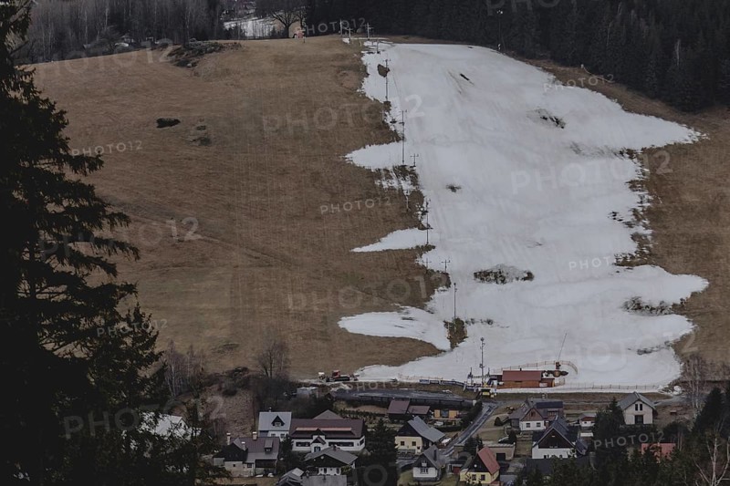 A partially melted piste can be seen on a slope, taken in the Jizera Mountains ski resort near Albrechtice v Jizerskych Horach, 05/02/2024. The Czech low mountain range with its ski resort is affected by increasingly warmer and shorter winters