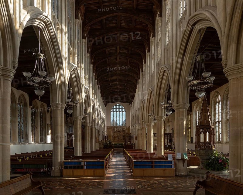 Interior of Holy Trinity Church, Long Melford, Suffolk, England, UK view down nave to east window