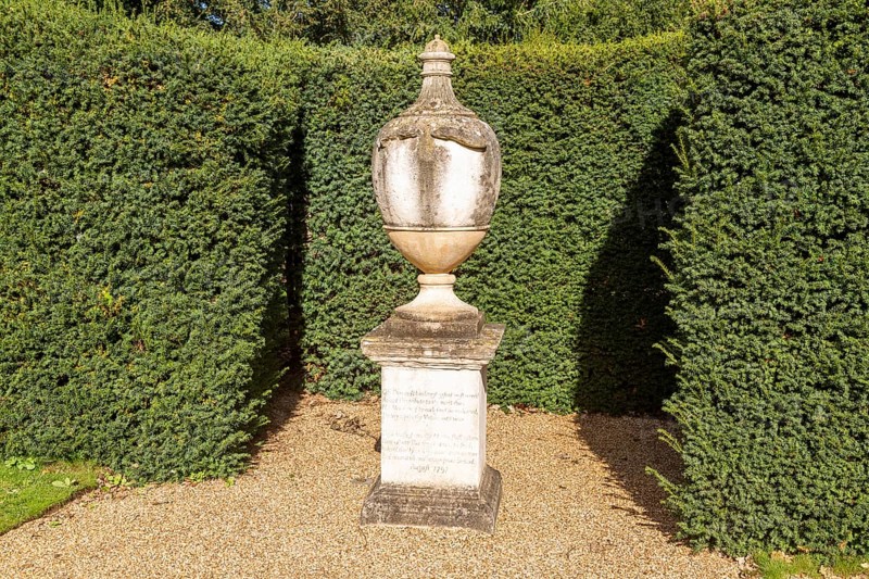 18th century stone memorial sculpture in garden, Audley End House and Gardens, Essex, England, UK