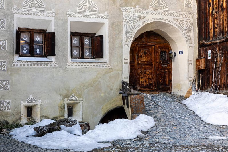 House entrance door, window, historic house, sgraffito, facade decorations, Guarda, Engadin, Grisons, Switzerland, Europe