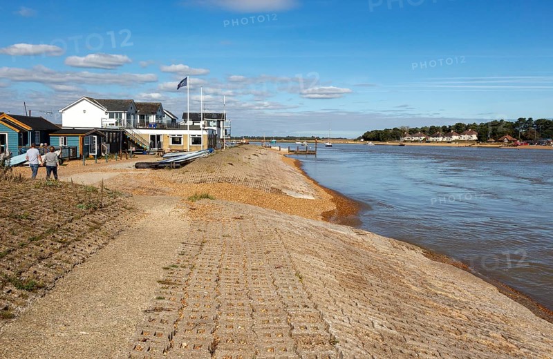 River Deben at Felixstowe Ferry, Suffolk, England, UK with Bawdsey Quay opposite, sailing club building