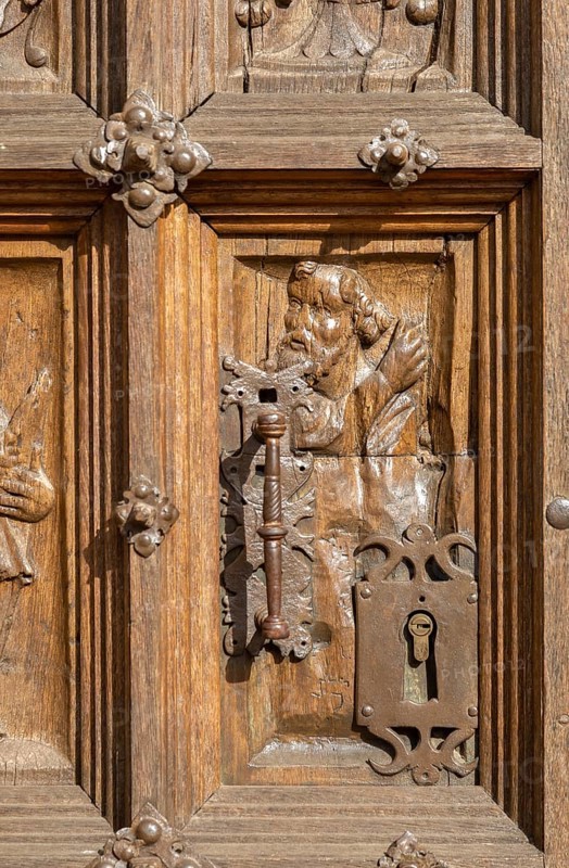 Historic carvings on wooden church door, Santa Maria la Mayor, Ezcaray, La Rioja, Spain, Europe