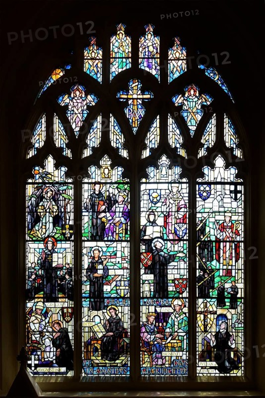Stained glass window of saints, Bauchon chapel of Our Lady of Pity, Norwich Cathedral, Norfolk, England, UK