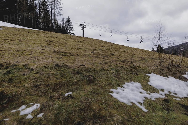 A chairlift, photographed on a ski slope in the Jizera Mountains ski resort near Albrechtice v Jizerskych Horach, 05/02/2024. The Czech low mountain range with its ski resort is affected by increasingly warmer and shorter winters