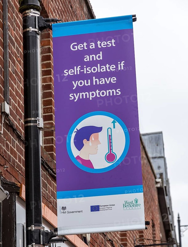 Get a test and self-isolate if you have symptoms Covid 19 information poster, Newbury, Berkshire, England, UK