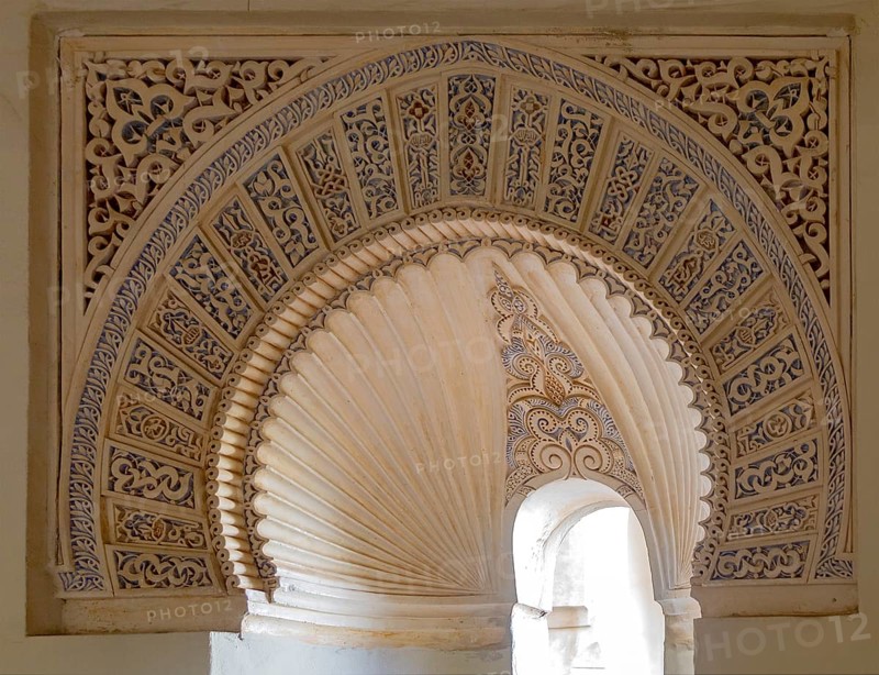 Islamic design architectural detail inside the Moorish palace of the Alcazaba, Malaga, Andalusia, Spain, decorated arches, Europe