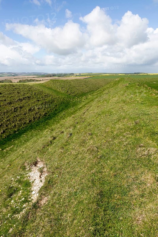 Defensive ramparts and ditch Yarnbury Castle, Iron Age hill fort, Wiltshire, England, UK