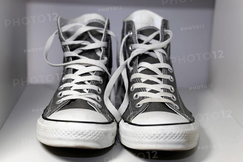 Grey Chucks on a shelf