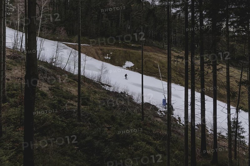 A skier on a ski slope in the Jizera Mountains ski resort near Albrechtice v Jizerskych Horach, 05.02.2024. The Czech low mountain range with its ski resort is affected by increasingly warmer and shorter winters
