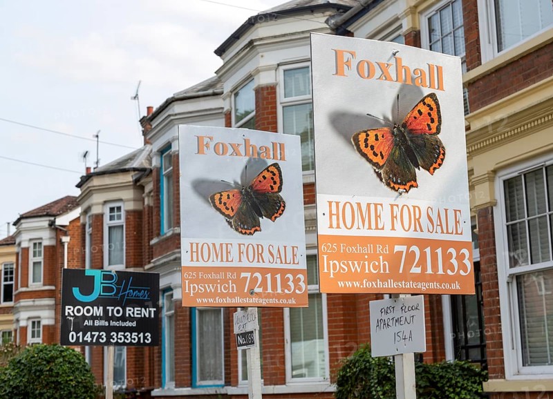 Estate agent signs for apartment flats for sale and room to rent, Spring Road, Ipswich, Suffolk, England, UK