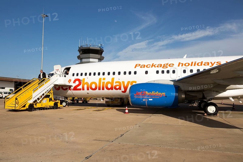 Jet2 package holiday plane passengers disembarking at the airport Faro, Algarve, Portugal, Europe