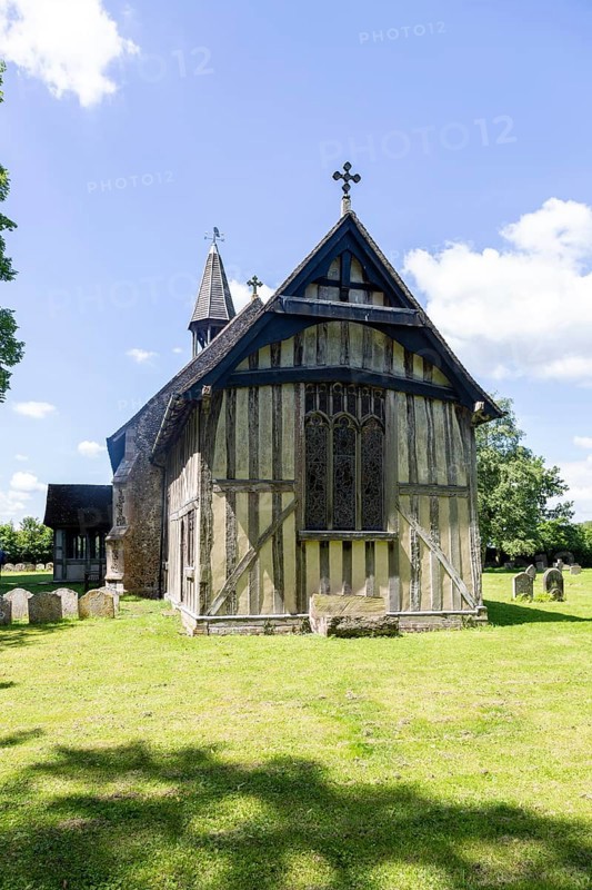 Village parish church of All Saints, Crowfield, Suffolk, England, UK with wooden timber framed chancel