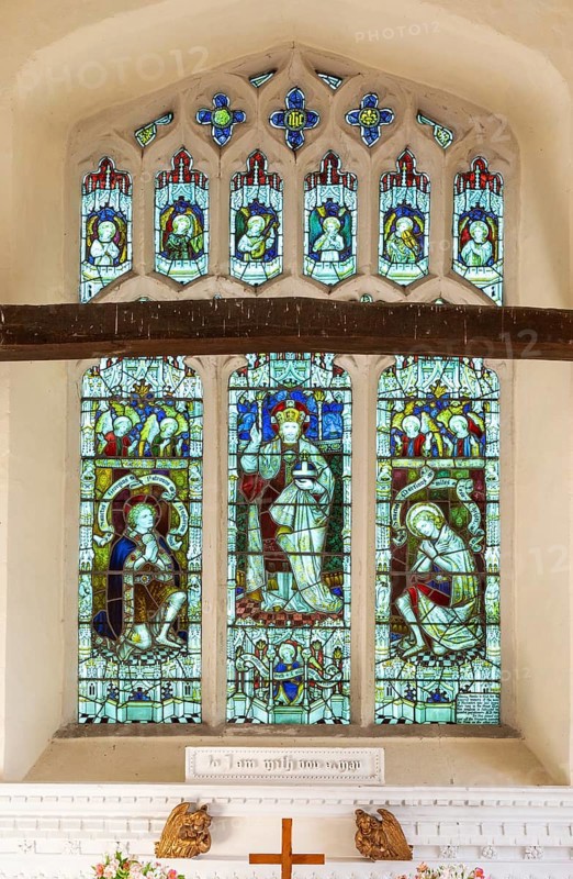 Stained glass east window Christ the King, Hacheston church, Suffolk, England, UK c 1919 war memorial by Kempe and Co