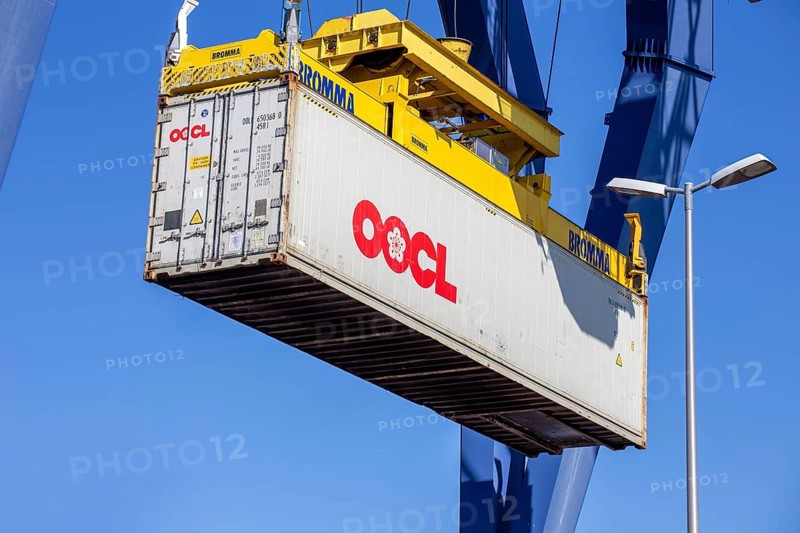An OOCL Orient Overseas Container Line container is loaded in the port of Mannheim, Germany. Supply bottlenecks and a sharp rise in container prices are currently affecting global trade