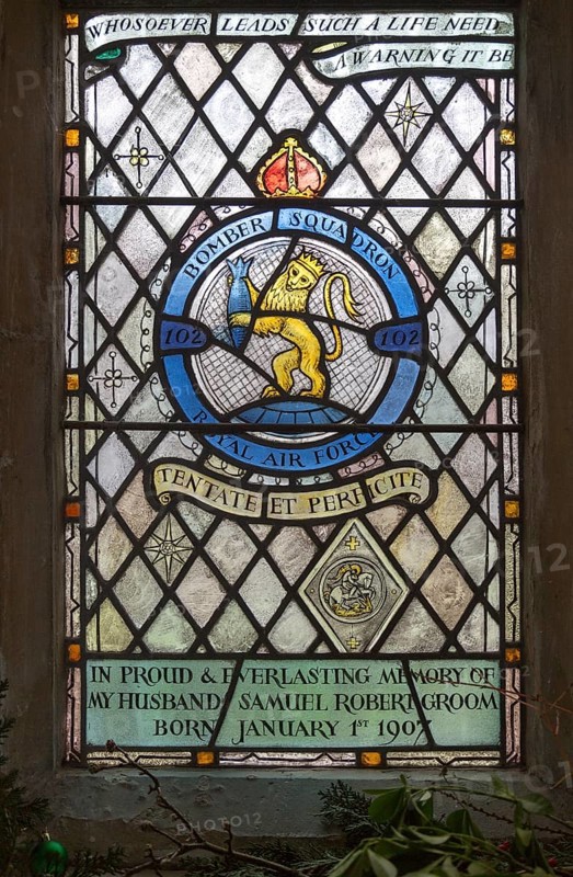 Church of Saint Mary, Chediston, Suffolk, England, UK stained glass window detail of 102 Bomber Squadron by Margaret Edith Aldrich Rope 1947