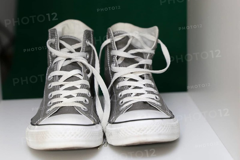 Grey Chucks on a shelf