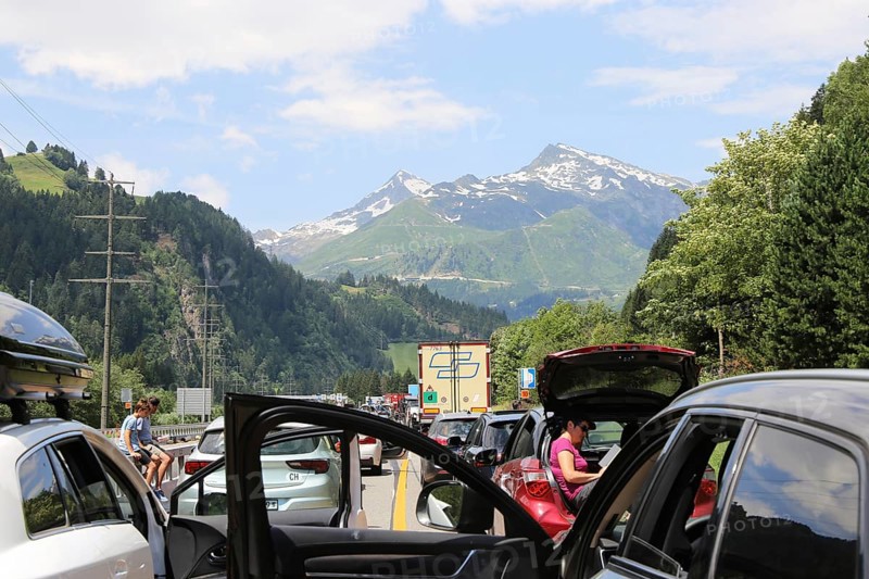 After an accident in the Gotthard tunnel in Switzerland, a long traffic jam forms in front of it