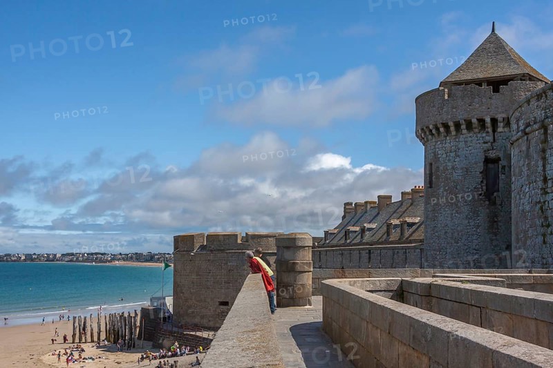 Tourists on the city wall of Saint Malo, Brittany, France, Europe