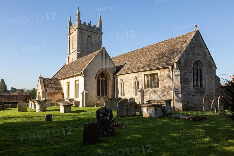 Graves in the graveyard of the village parish church of Saint James the Greater, Dauntsey, Wiltshire, England, UK