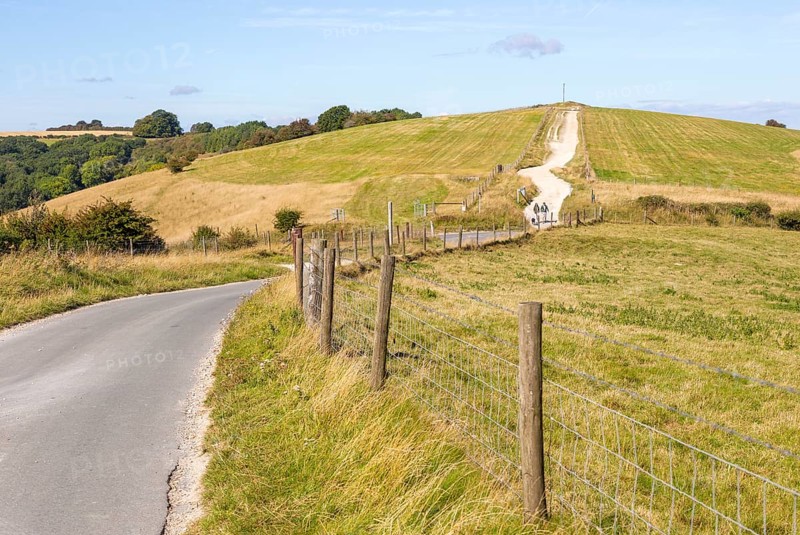 Road and track along top of chalk scarp view to Combe Gibbet, Inkpen Hill, Berkshire, England, UK