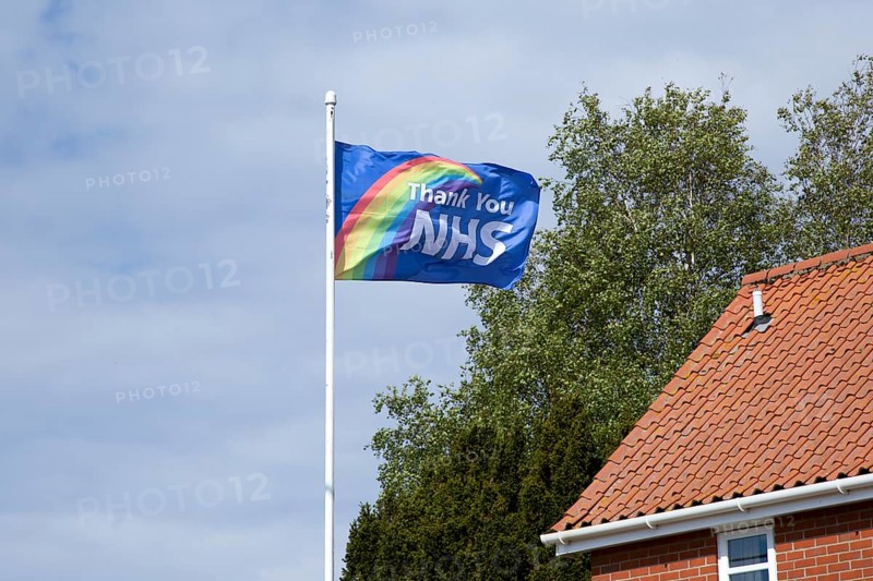 Thank You NHS flag flying in breeze, UK during 2020 Coronavirus Covid-19 crisis