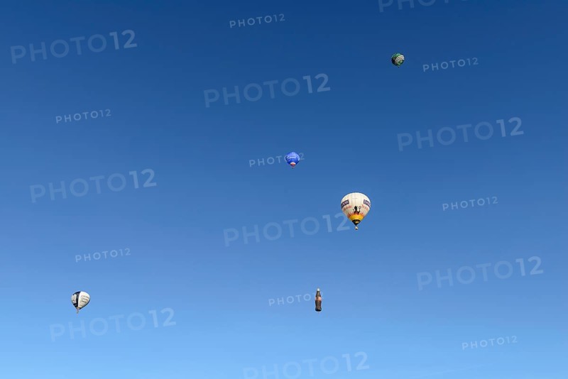 Five hot air balloons in the blue sky, Montgolfiade Tegernseer Tal, Balloon Week Tegernsee, Warngau, Bavarian Oberland, Upper Bavaria, Bavaria, Germany, Europe