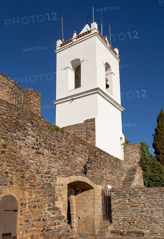Whitewashed tower and gateway to historic walled hilltop village of Monsaraz, Alto Alentejo, Portugal, southern Europe, Europe