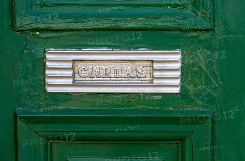 Close up of traditional style letterbox on front door of house in Evora, Alto Alentejo, Portugal, Europe