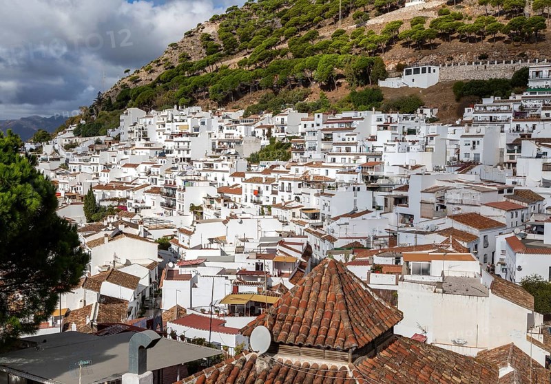Whitewashed houses on hillside in mountain village of Mijas, Costa del Sol, Malaga province, Andalusia, Spain, Europe