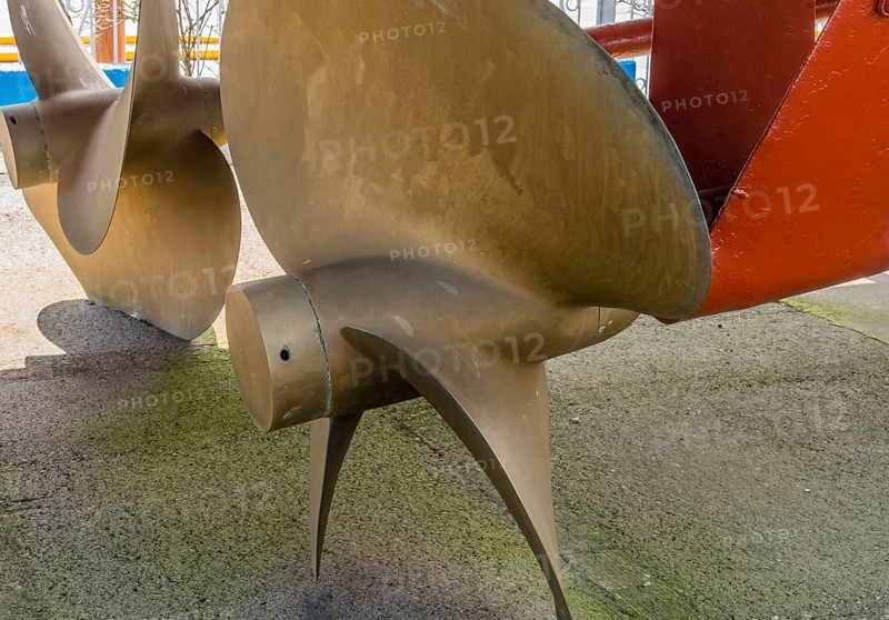 Closeup of large metal propeller on retired frigate on display at public park in Seosan, South Korea, Asia