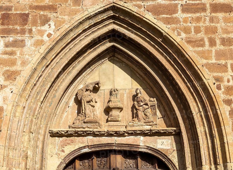Aragonese Gothic architectural style carvings around doorway, Santa Maria la Mayor, Ezcaray, La Rioja, Spain, Europe