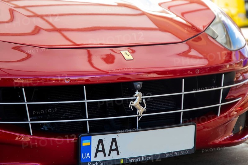 Close-up of a red Ferrari FF (seen at the Ellwanger Berge motorway service area, Baden-Wuerttemberg, Germany)